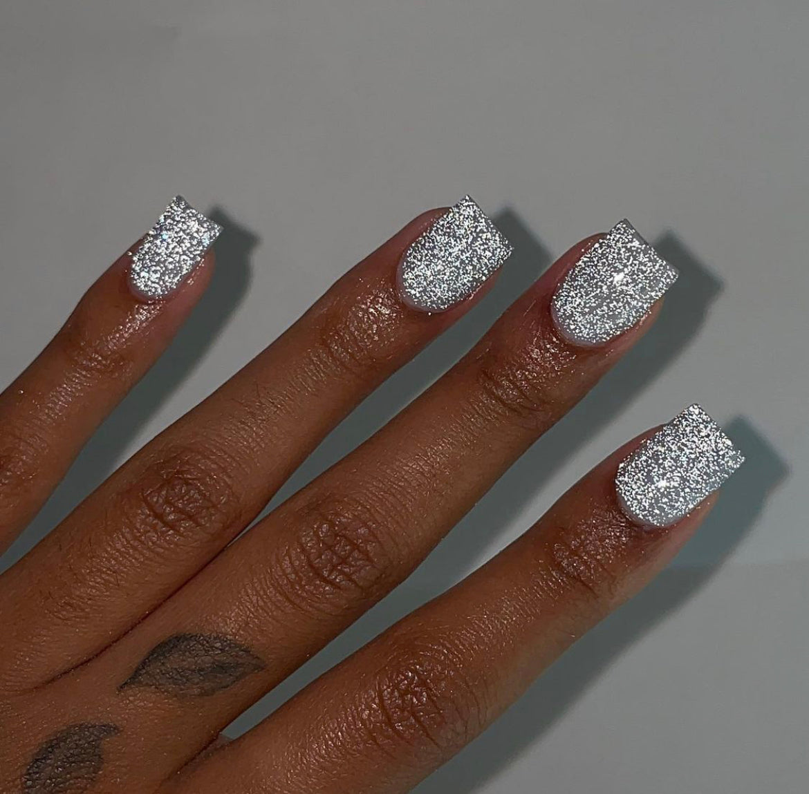 REFLECTIVE TOP COAT A’GALORE & CO.